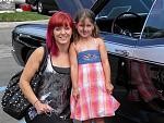 Two of my favorite ladies.  My daughter Lacie and my grand daughter Melhoney.  Taken at Great Lakes Crossing Car Show 2011.