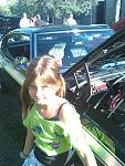 Melhoney, my grand daughter, posing in front of my car at the Berkley CruiseFest.  August 17,  2012.