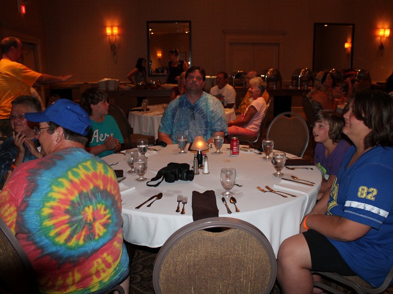 Our table at the banquet, John (flash) and Joan on the left, then Jacob, grumpy, Leah and Lauren.