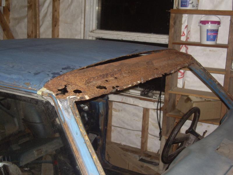 Just above the wind shield, not to sure if there.s to much rust here or not