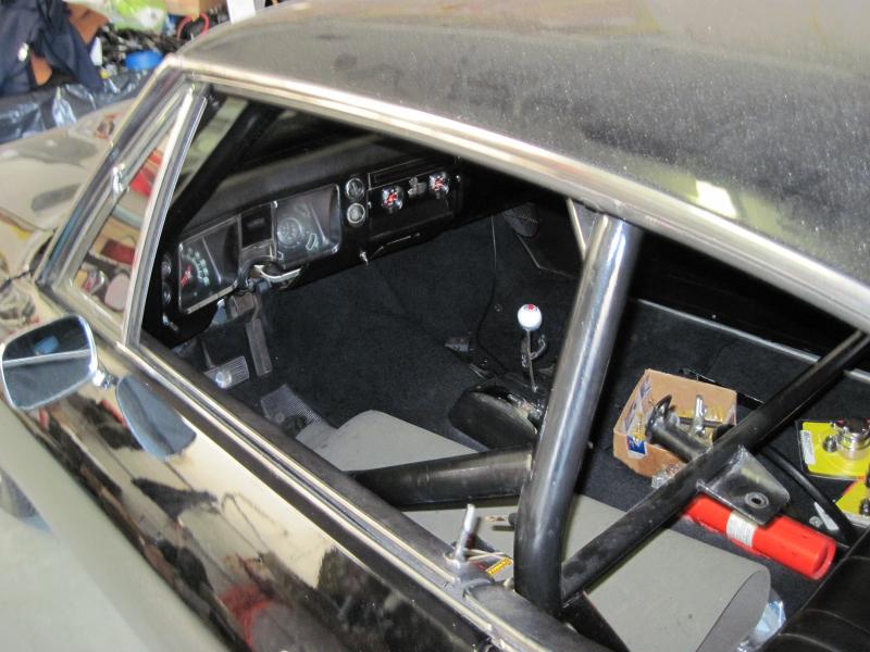 IMG 0360
This was my childhood buds car he found a picture of me under the dash when I was 18 (now 52 lol) installing a sun oil pressure gauge in the middle of that fake clock you can see it in the pic