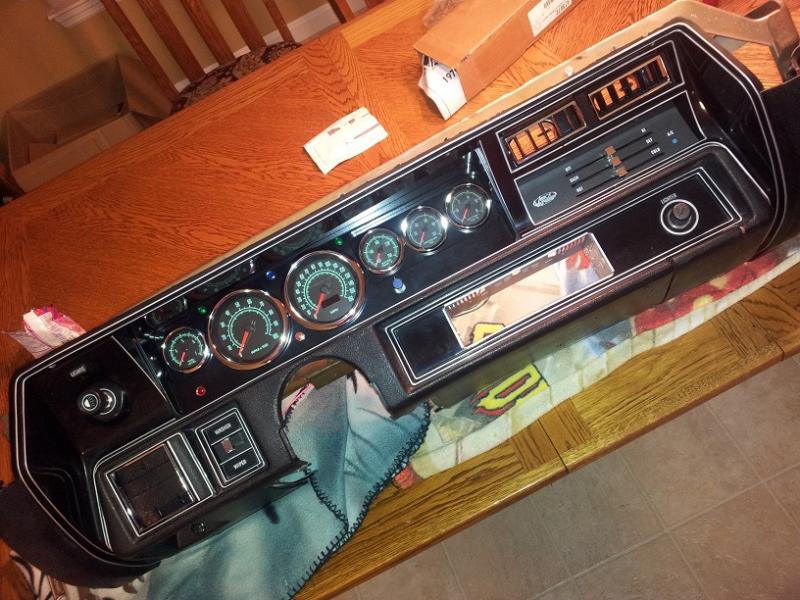 Restored dash with Metrom dash insert and New Vintage 1969 series gauges.