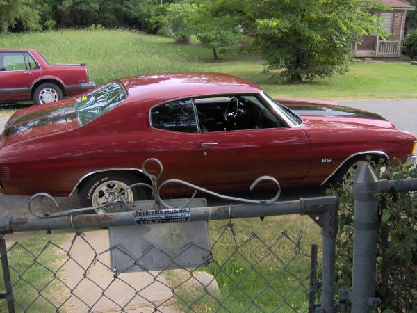 72 Malibu just back from paint...July 06. The fence got in the way.lol.