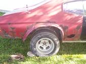 Two owners before me cut the quarter panels out and bondoed these fender flares on to cover the tires.