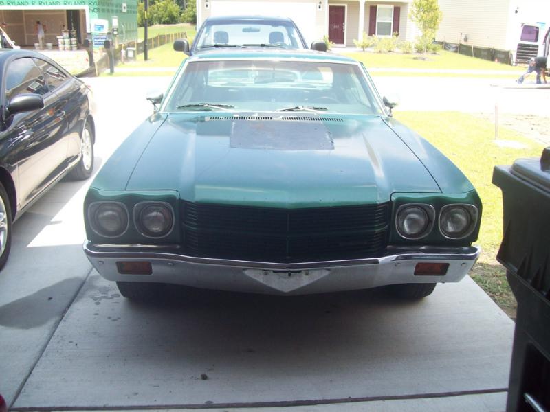 For some reason, previous owner ripped off the bolt on cowl. Just going to replace with a glass hood :D