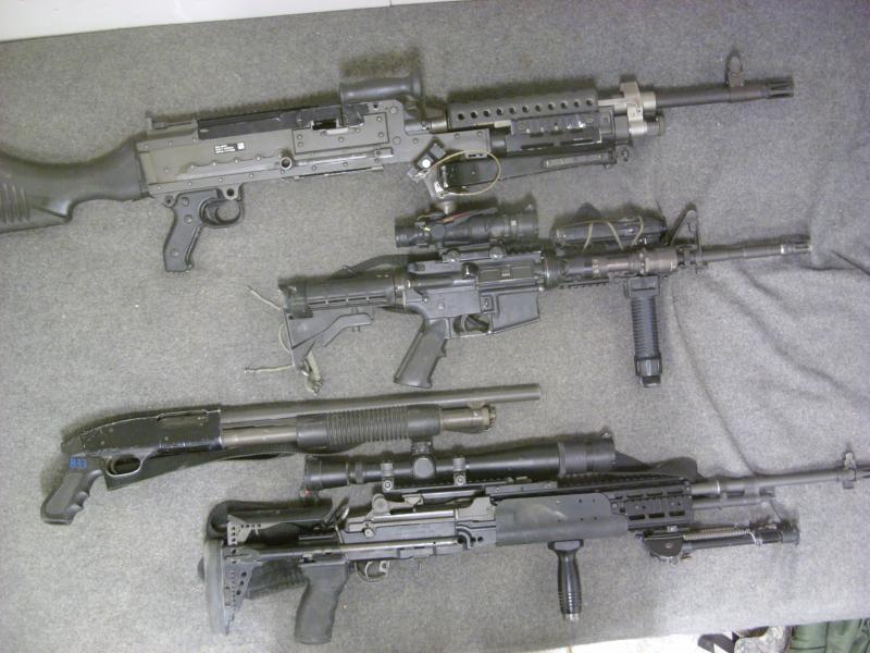 How many guns goes one person need. In my case I guess 4. From top to bottom 240B Machine gun that spits out 900 rounds per minute. M4 assault rifle, Mossberg sawed off shotgun, and my baby the M-14 sniper system zeroed out to 900 yards